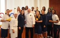Photo of Ruiz, Marshall and U.S. 
Women's Volleyball Team
